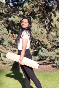 Garima Bathla Holding a Yoga Mat